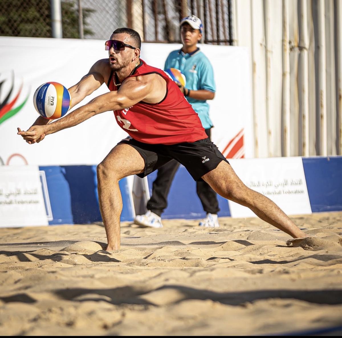 Omar diving for a dig on the sand for Team Lebanon
