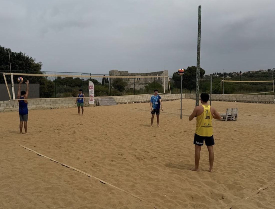 Players training on Omar's two sand courts